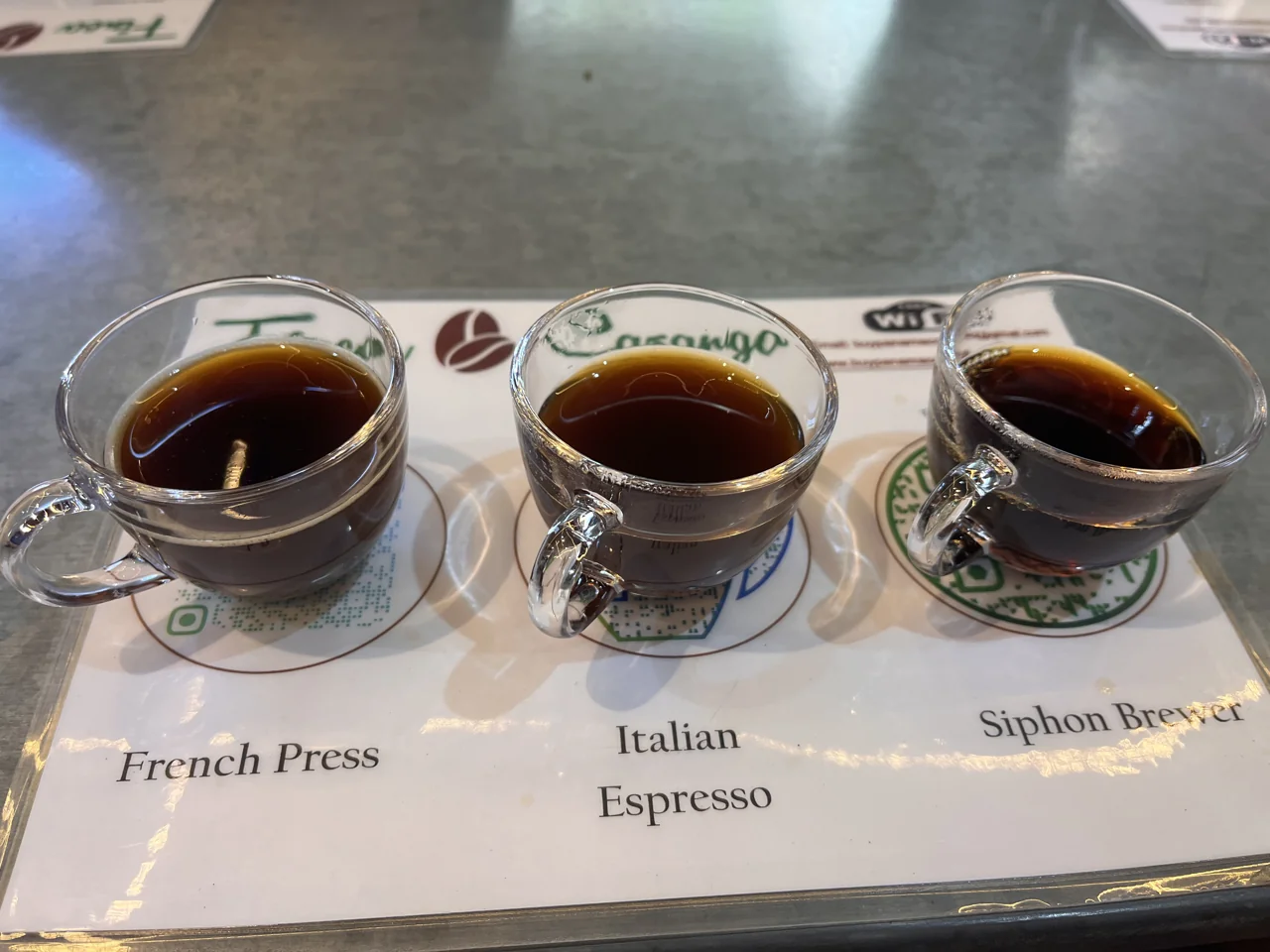 Three locally prepared coffees at a tasting in Panama